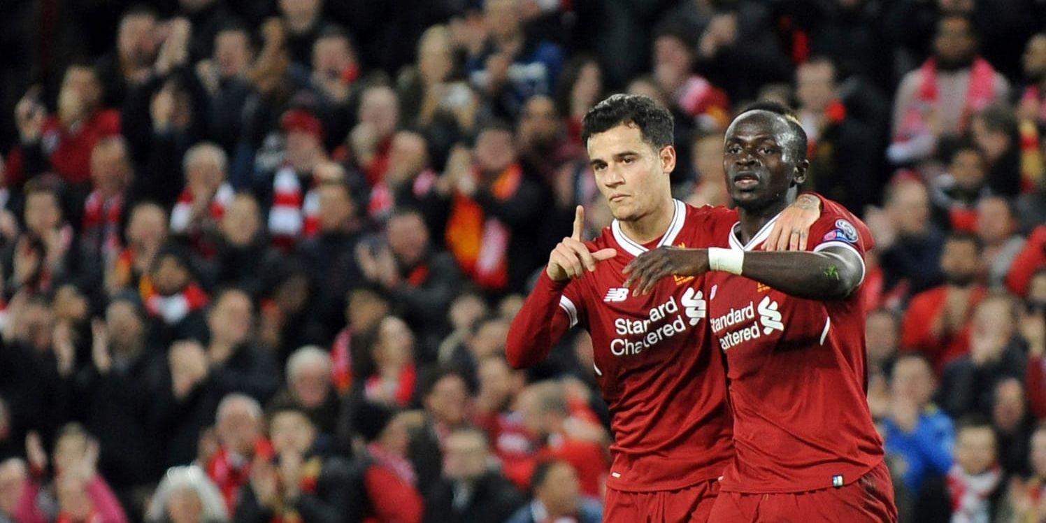 Liverpools Sadio Mané och Philippe Coutinho firar ett av de sju målen mot Spartak Moskva.