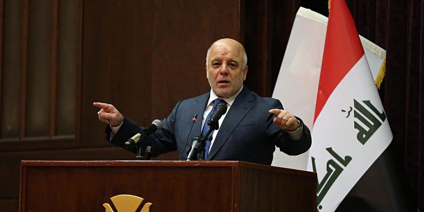 Iraks premiärminister Haider al-Abadi utropar seger över IS.